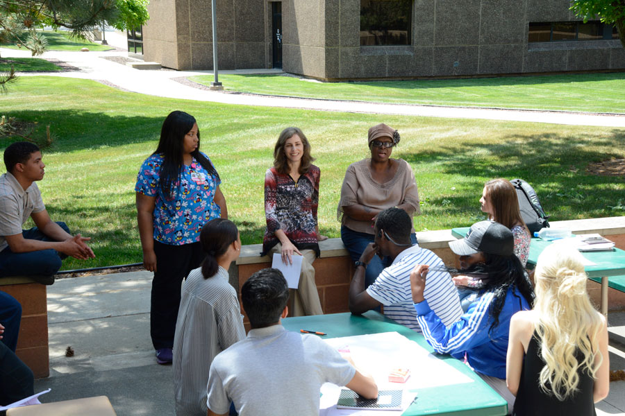 Students enjoying the outdoor patio at Main Campus Flint