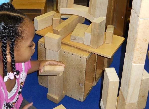 Child playing with blocks