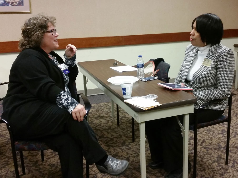 President Dr. Beverly Walker-Griffea with MCC alumna.