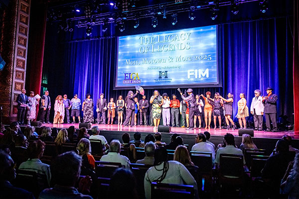 Mott, Motown and More event photo of all the performers standing in a row across the stage during the finale