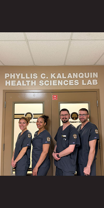 Nursing Students at the entrance of the Phyllis C. Kalanquin Health Science Lab