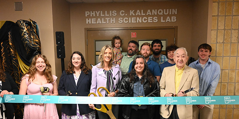 Ribbon cutting - Kalanquin Family and MCC President Shaunda Richardson-Snell