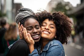 two students hugging