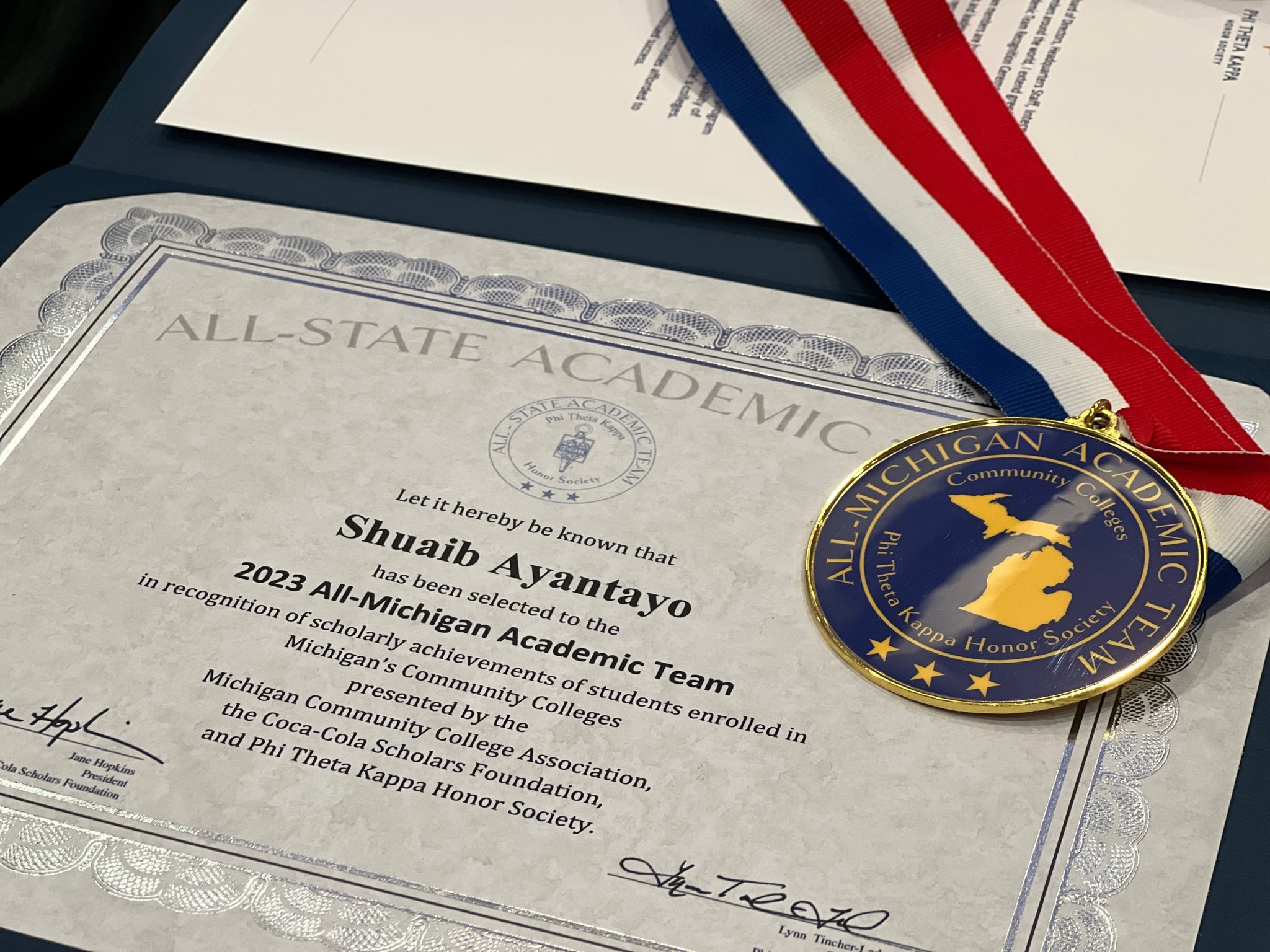 All-state academic award certificate and medallion