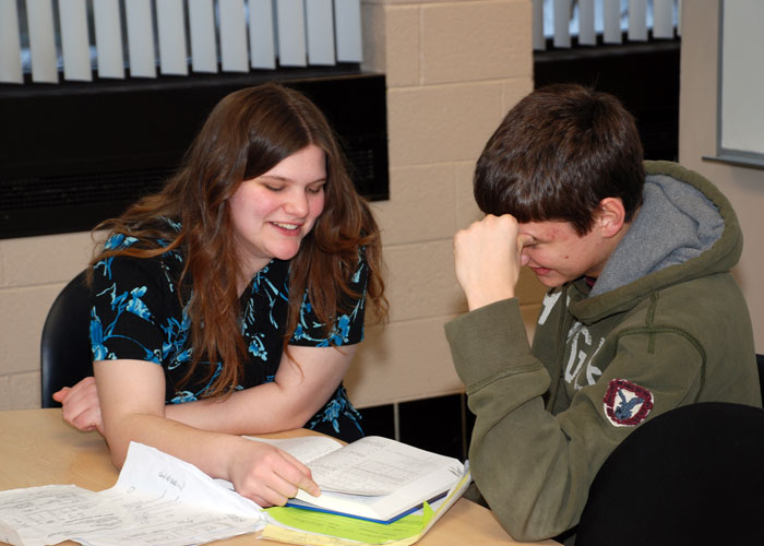 Students working on math problems together