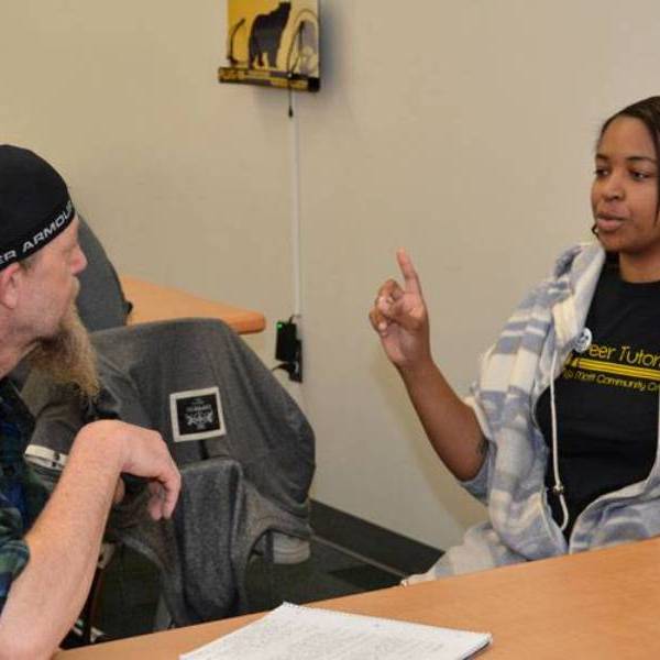 two students conversing