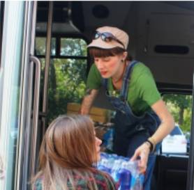 student delivering water