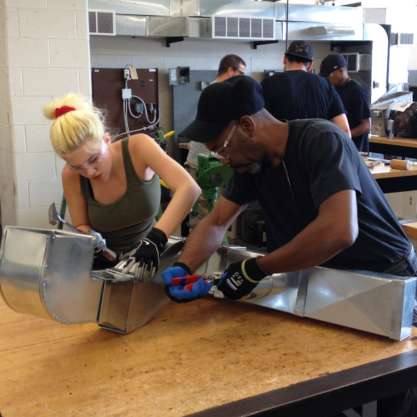 two students ind duct class